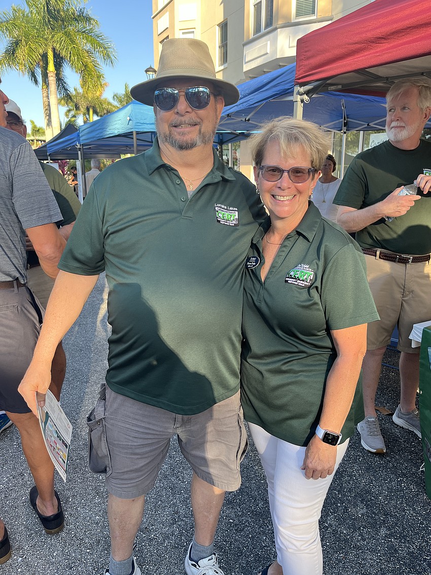 Lakewood Ranch Community Emergency Response Team members Lorraine Lakes' Gary Cockfield and Del Webb's Sheree Parke want people to be prepared for hurricane season, so they are handing out hurricane guides.