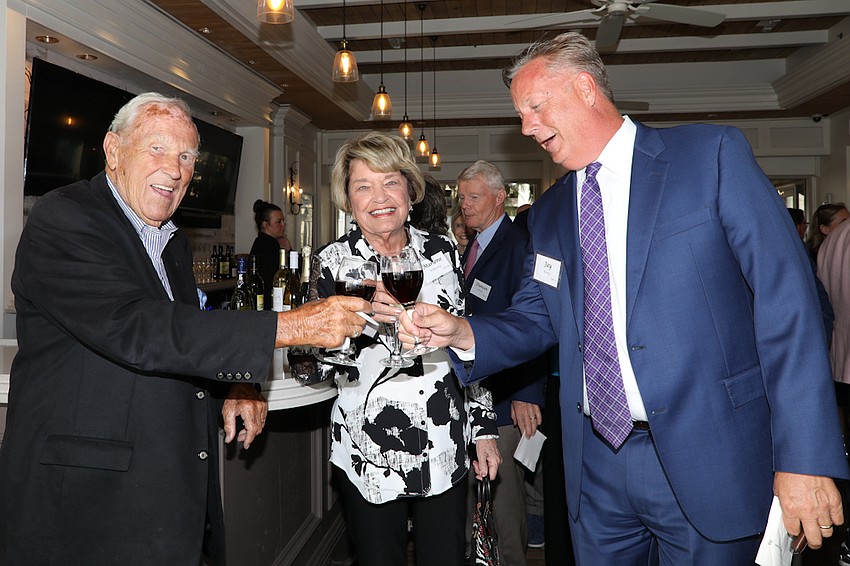Kurt and Marlene Wilkening toasting to music with Jay Young