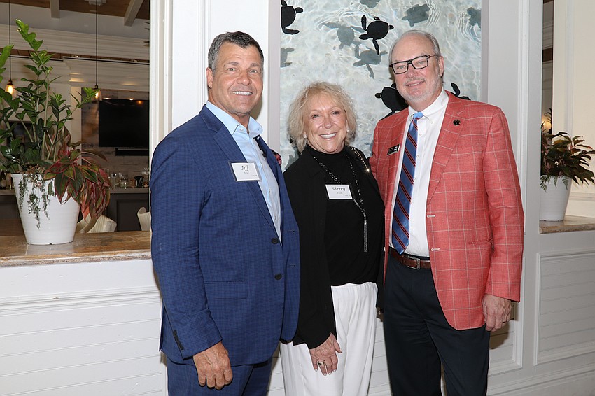 Jeff Boyd, Sherry Koski and board member Tom Koski