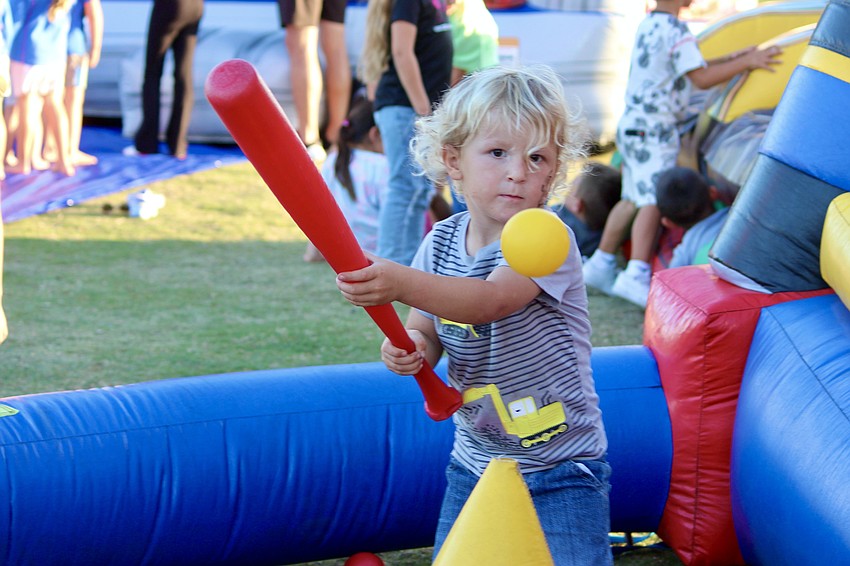 Harry Noordsy, 3, keeps his eye on the floating ball.