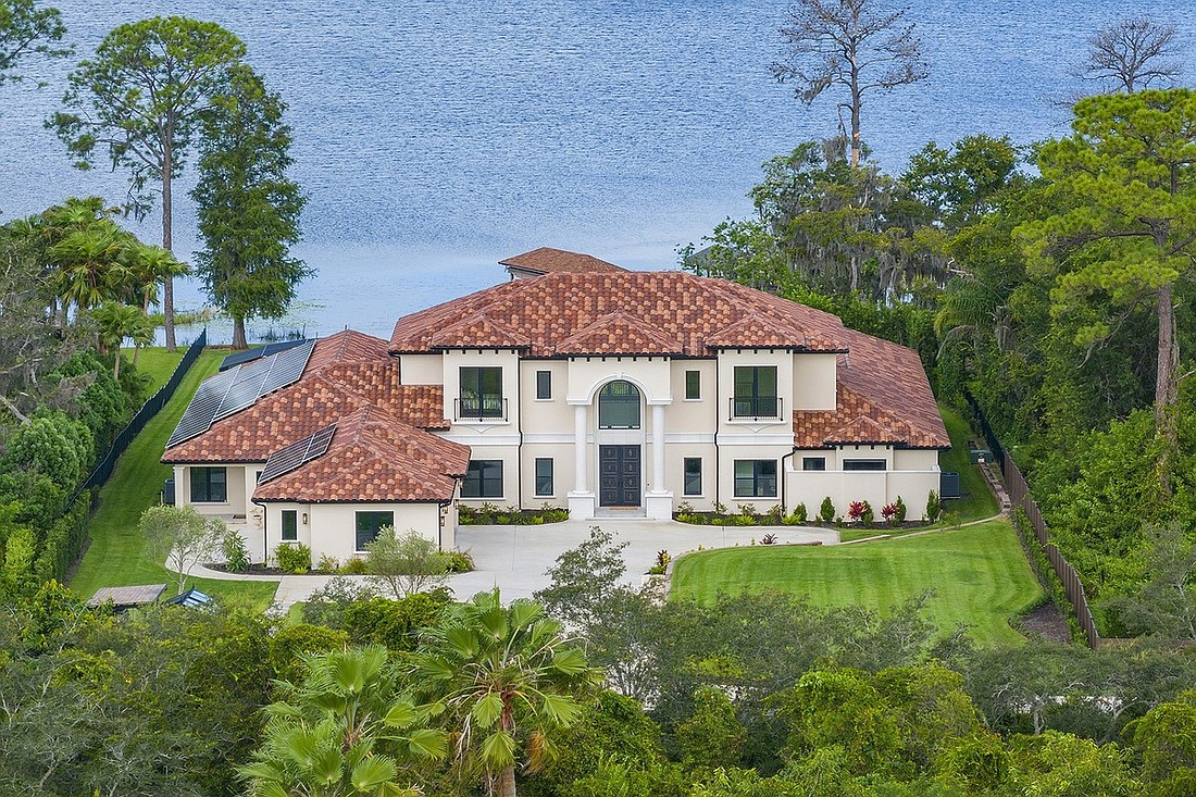The home at 8990 Darlene Drive, Orlando, sold April 12, for $7,400,000. This 7,776-square-foot estate sits on a 3.39-acre lot that has 120 feet of water frontage on Pocket Lake. The sellers were represented by Flavia Bazzon, Premier Sotheby's International Realty.