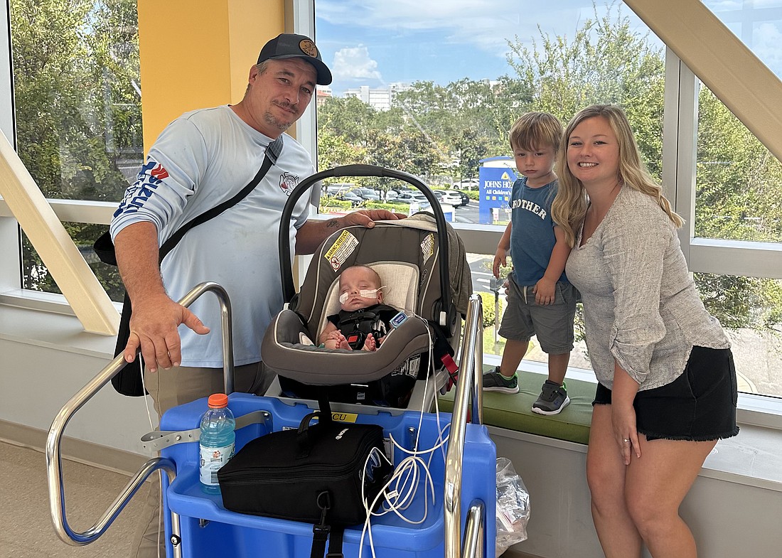 LJ Young, 3-year-old Lincoln Young and Amy Smith were excited to bring Cole Young home after 155 days in the hospital. The family is grateful for the money raised to support them through the Elks Riders Brain Injured Child Ride.