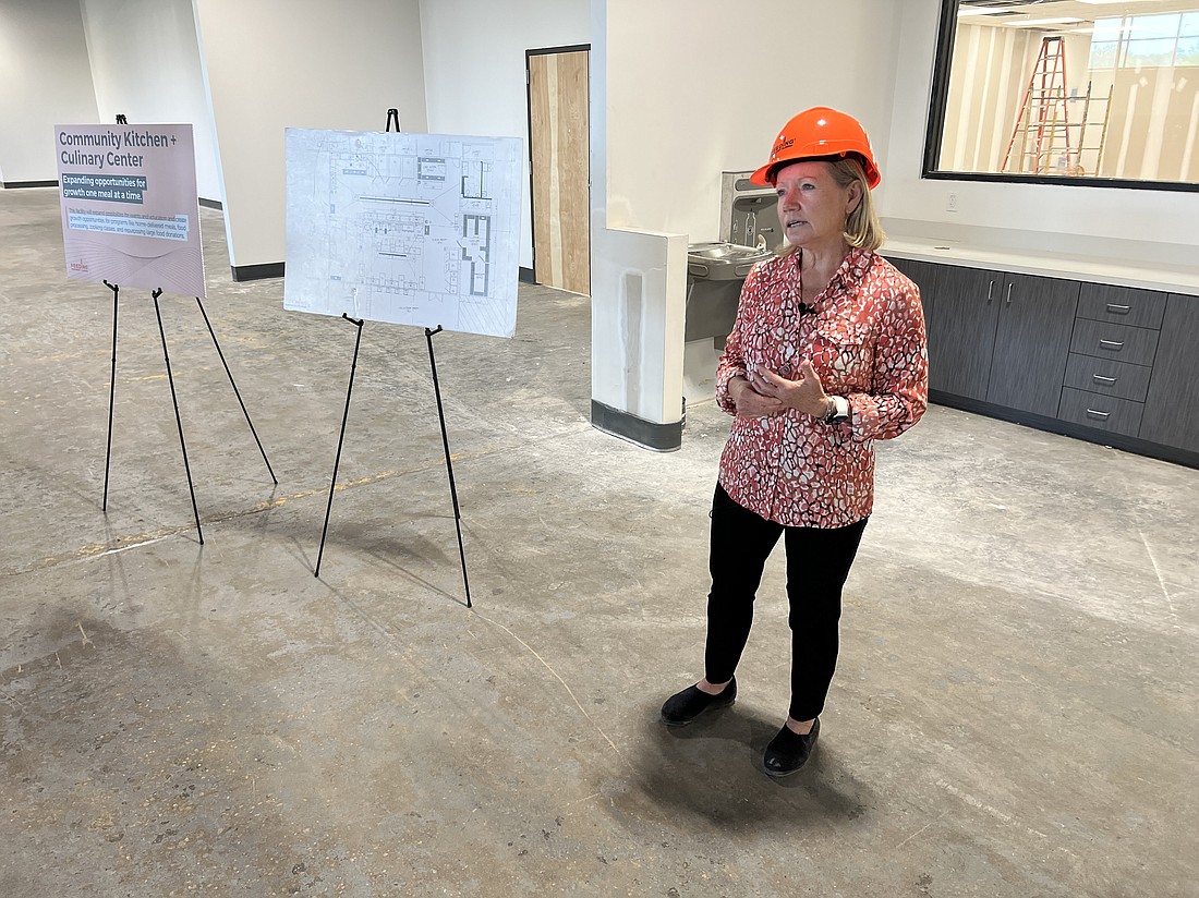 Susan King, Feeding Northeast Florida president and CEO, speaks during a pre-opening tour of the organization's new facility at 5245 Old Kings Road near Interstates 10, 95 and 295.