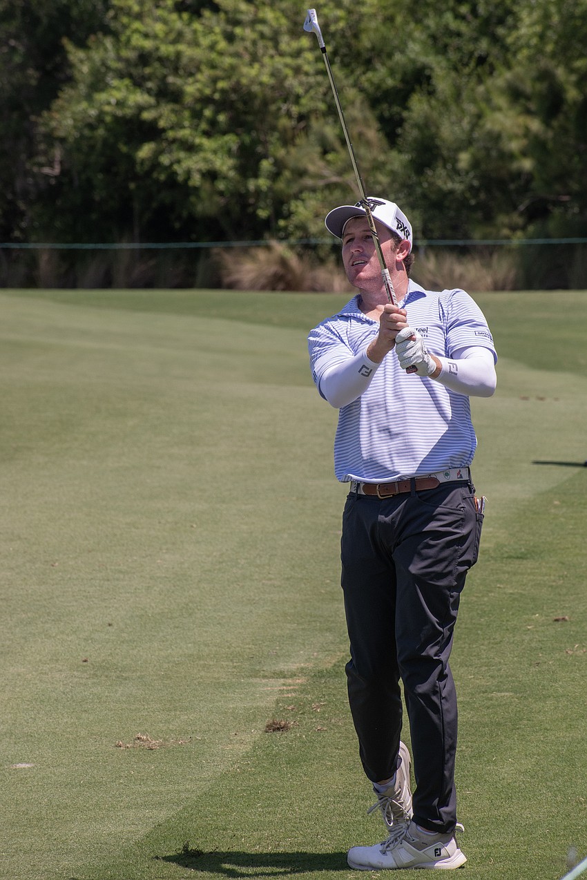 Patrick Cover hits his second shot on the No. 1 hole at Lakewood National Golf Club during the first round of the 2024 LECOM Suncoast Classic. Cover shot eight under par for the round and is tied for second place.