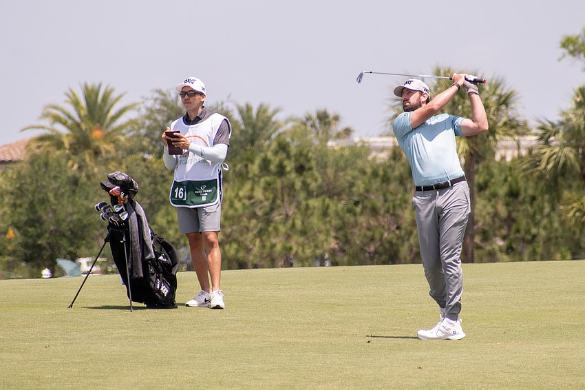 Cristobal Del Solar hits his second shot on the No. 1 hole at Lakewood National Golf Club during the first round of the 2024 LECOM Suncoast Classic. Del Solar shot three under par for the day.