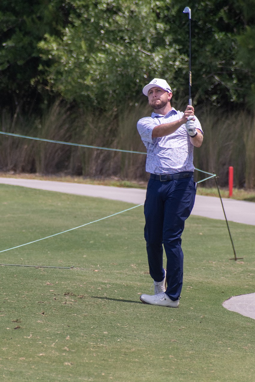 Alistair Docherty hits his second shot from outside the ropes on the No. 1 hole at Lakewood National Golf Club during the first round of the 2024 LECOM Suncoast Classic. Docherty shot two under par for the day.