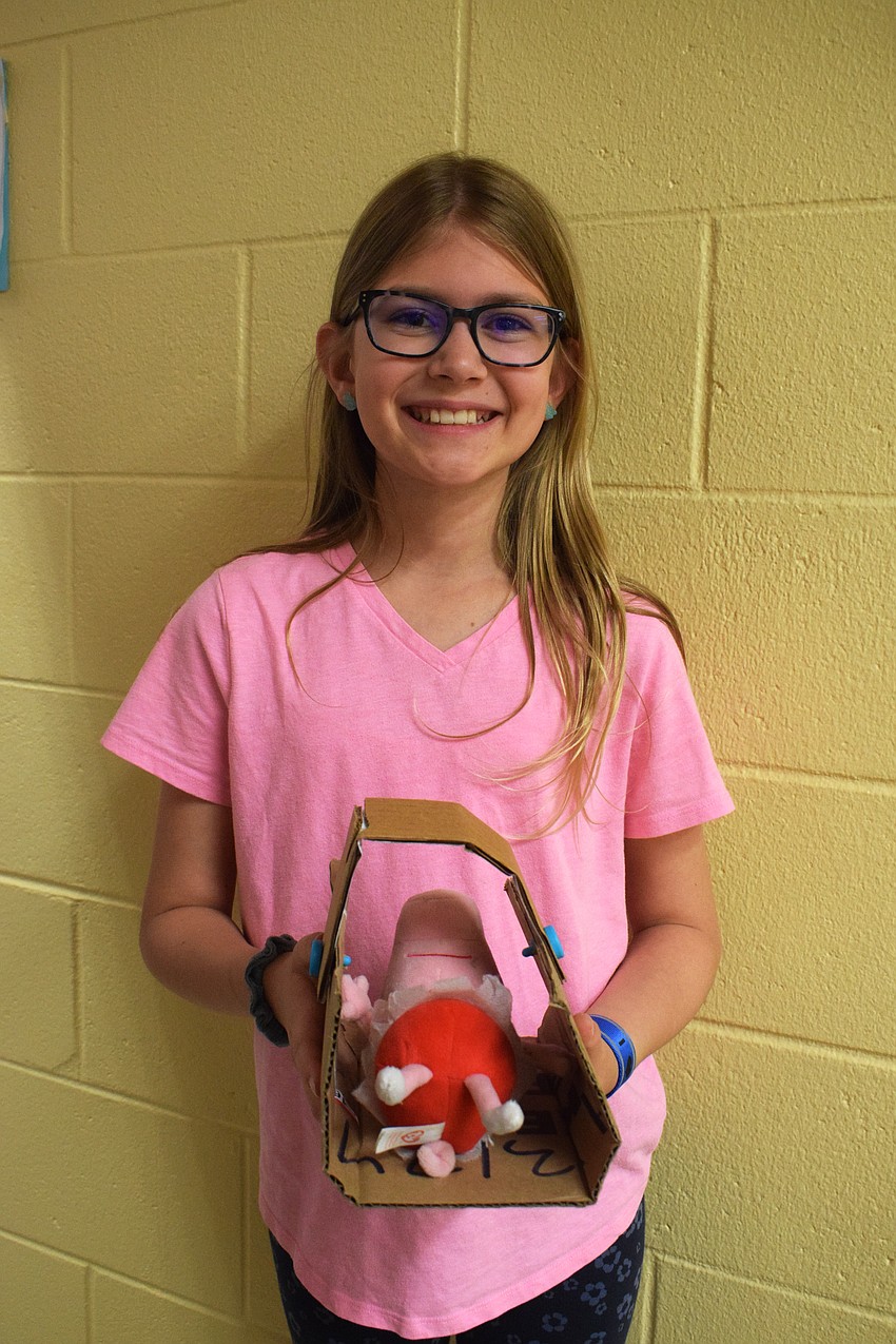 Fifth grader Hannah Wojtkowski says she wanted to make a container that would allow someone to carry a stuffed animal with ease while also being comfortable for the stuffed animal.