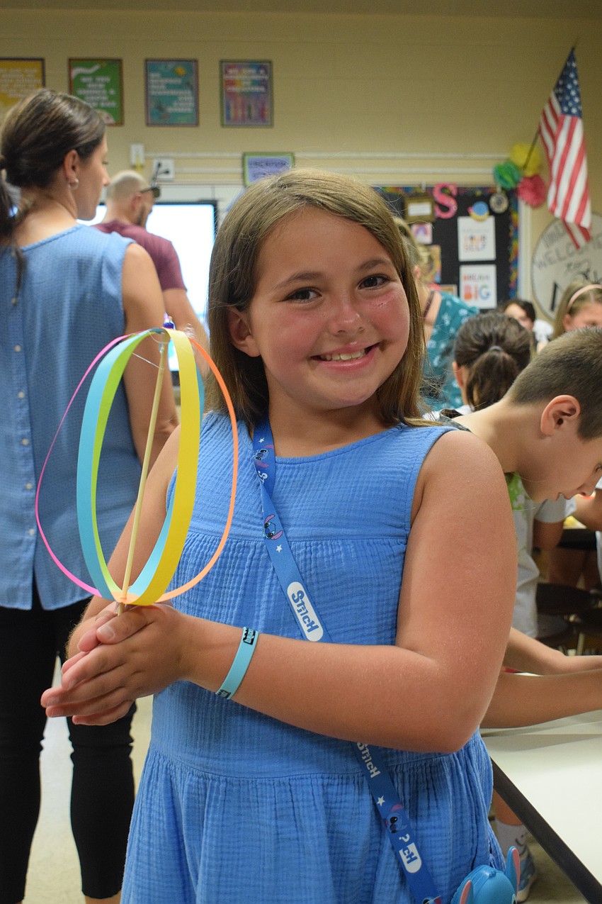 Third grader Avril Mordecai loves her new creation. 