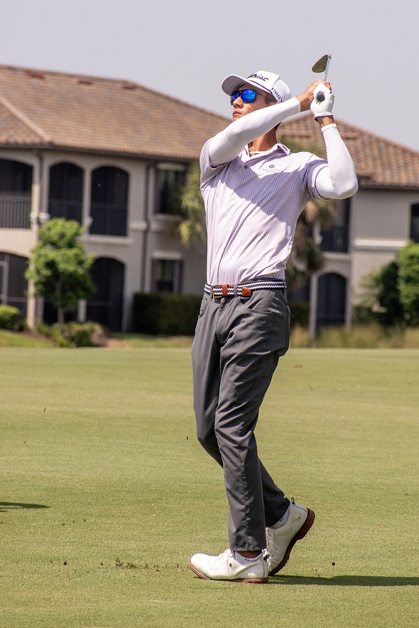 Ricky Castillo hits his second shot on the No. 1 hole at Lakewood National Golf Club during round two of the 2024 LECOM Suncoast Classic. Castillo shot five under par Friday and is eight under par overall.