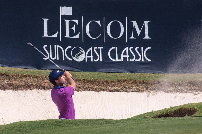 Alvaro Ortiz hits out of the bunker on the No. 18 hole at Lakewood National Golf Club during round two of the 2024 LECOM Suncoast Classic. Ortiz was three under par Friday and is five under par for the tournament.