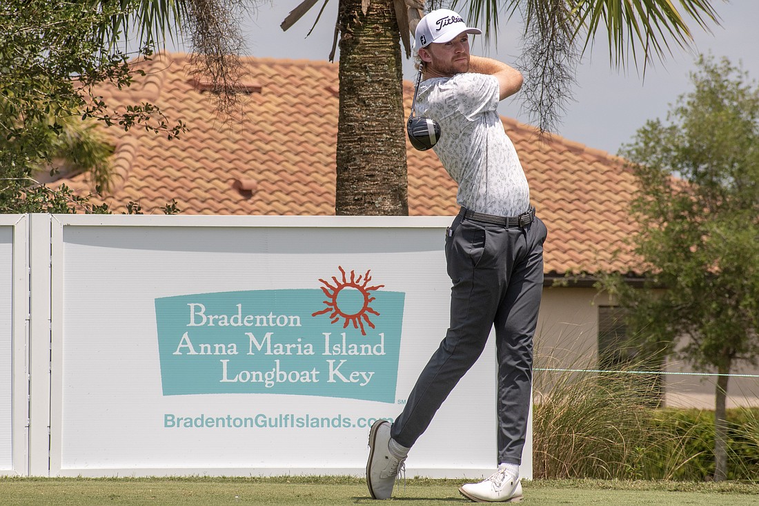 Danny Walker hits his tee shot on the No. 18 hole at Lakewood National Golf Club on day three of the 2024 LECOM Suncoast Classic. Walker, a Lakewood Ranch High graduate, shot eight under par Saturday and is 13 under par for the tournament.