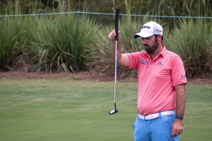 Brett Drewitt examines his putter and the green on the No. 17 hole at Lakewood National Golf Club on day three of the 2024 LECOM Suncoast Classic. Drewitt shot seven over par in round three. He finished one over par for the tournament.