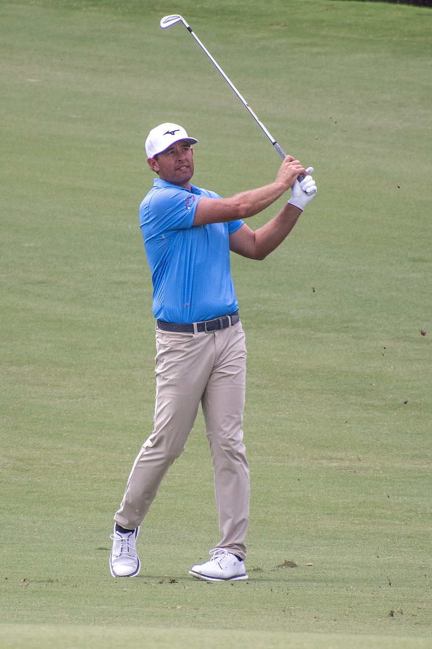 Brandon Harkins hits his second shot on the No. 16 hole at Lakewood National Golf Club on day three of the 2024 LECOM Suncoast Classic. Harkins shot three over par Saturday and is four under par for the tournament.