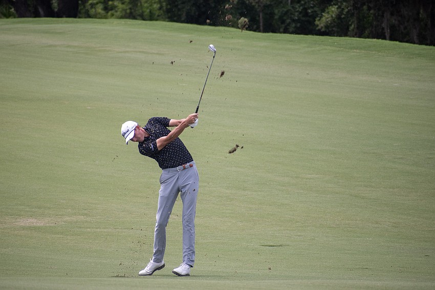 Ross Steelman hits his second shot on the No. 16 hole at Lakewood National Golf Club on day three of the 2024 LECOM Suncoast Classic. Steelman shot four under par Saturday and is 11 under par for the tournament.