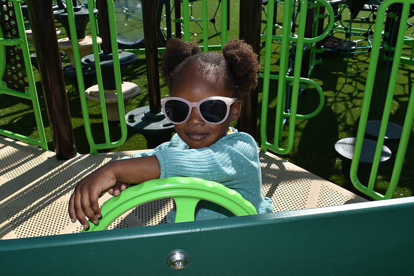 Two-year-old Kehlani Brown practices her driving.