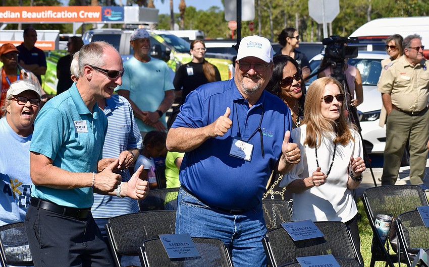 Kiwanis members Jeremy Riehl, Ken Christy and Susan Agruso dance along to the 