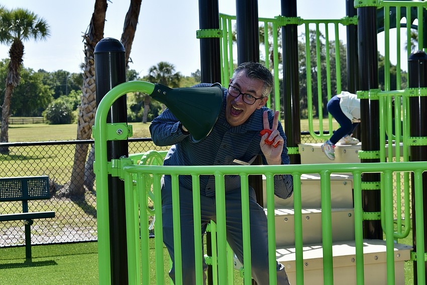 Communication Division Manager Casey Zempel tests out the talk tubes.