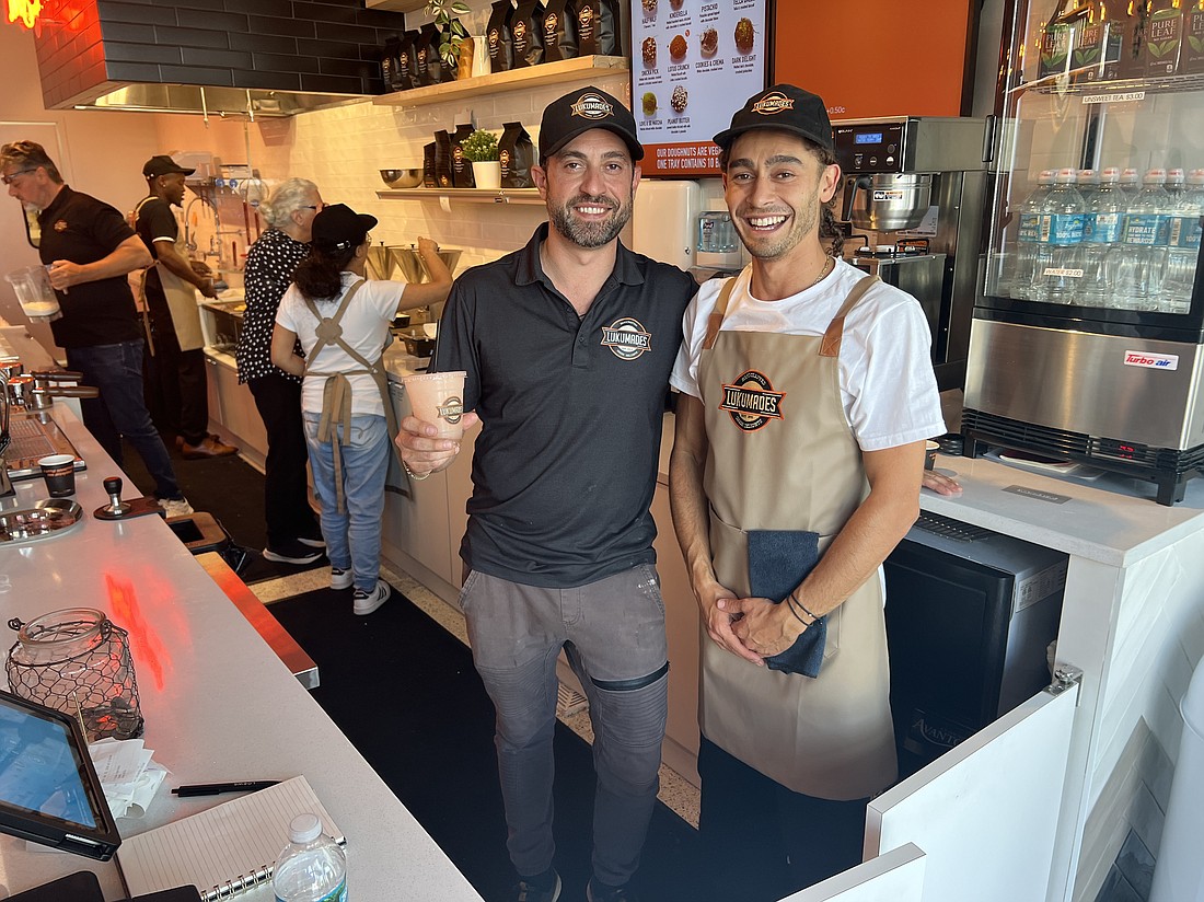 Bothers Leo (left) and Gio Georgallis have opened the first Lukumades store in the United States in Jacksonville Beach.
