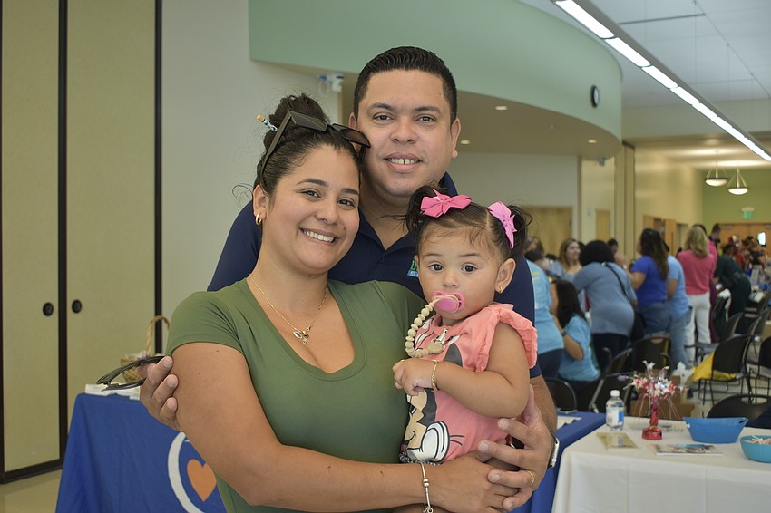 Mariely Rodriguez, Julio Pinto and Adaline Pinto, 1