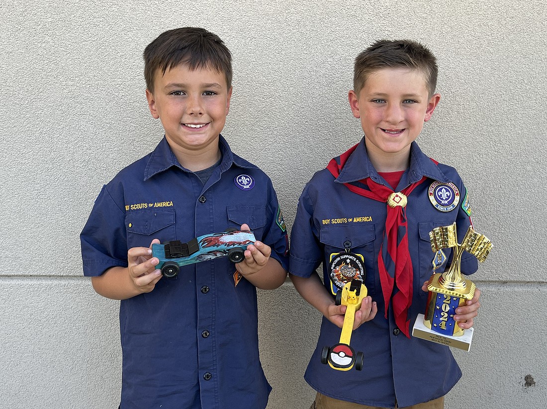 Lakewood Ranch's Grayson Yost and Logan Koehler love participating in the Pinewood Derby. They came up with the theme and design of their cars.