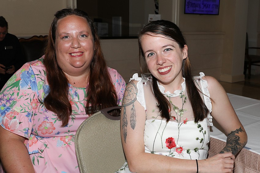 Jessica Farnsworth, and BBBS Intake Manager Jessy Swift check 220 guests into the Big Brothers Big Sisters Spring Soirée