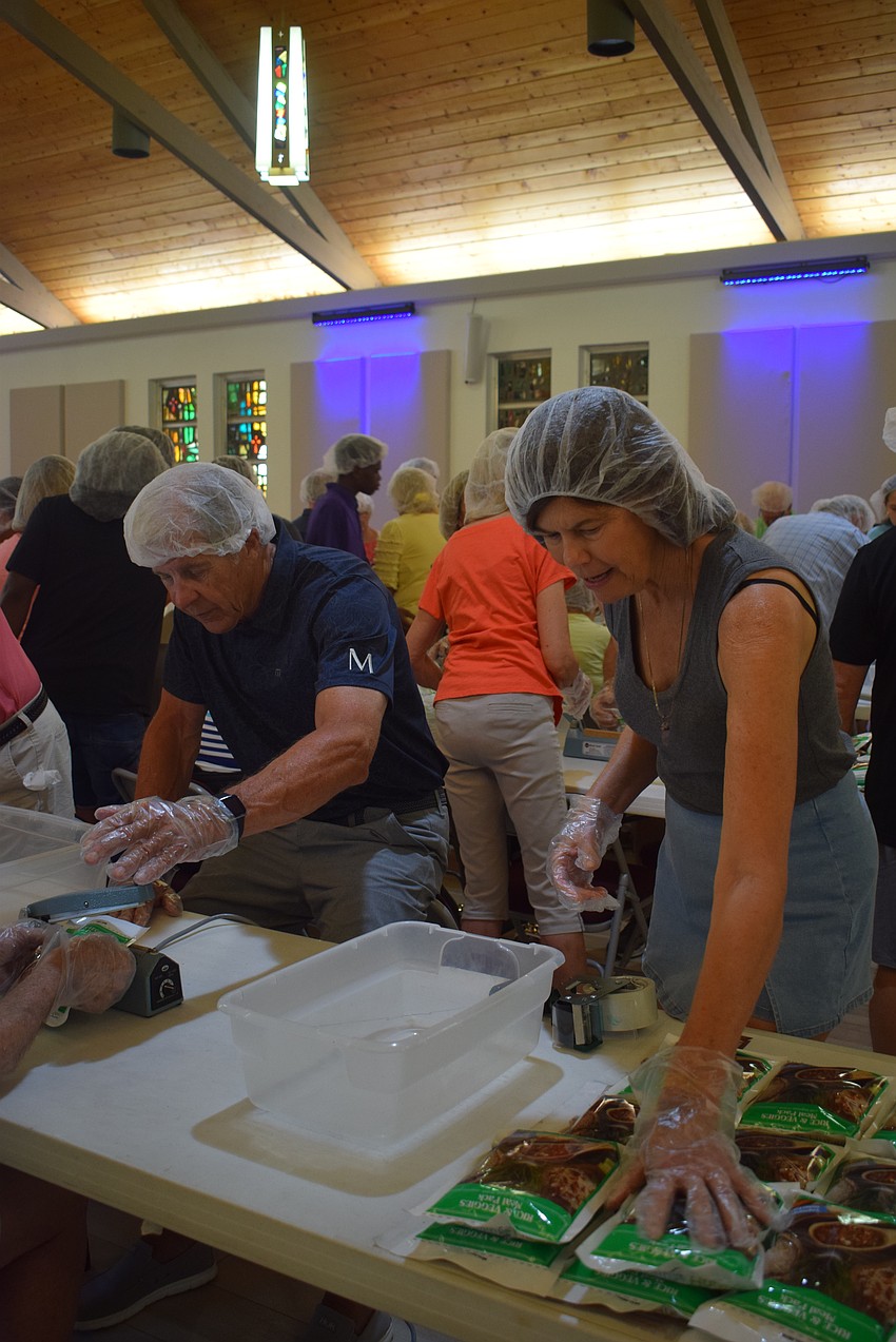 Bonnie Vannucci packing meals