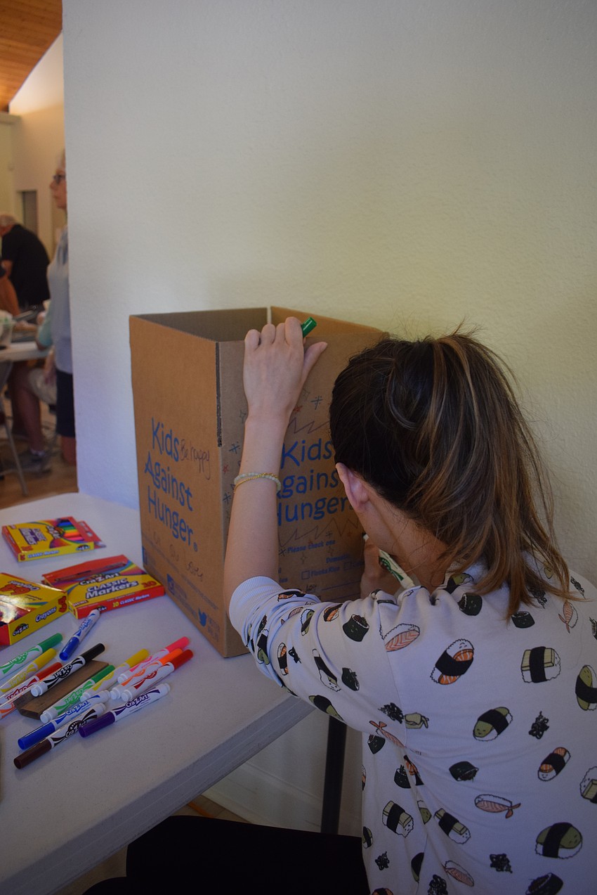 Jessica Treland decorating boxes