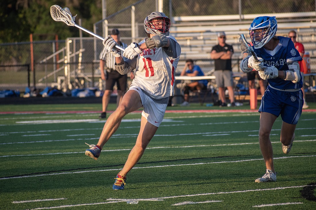 Mooney senior Hunter Sheffield rips a shot for a goal against Barron Collier. Sheffield had two goals in the game.