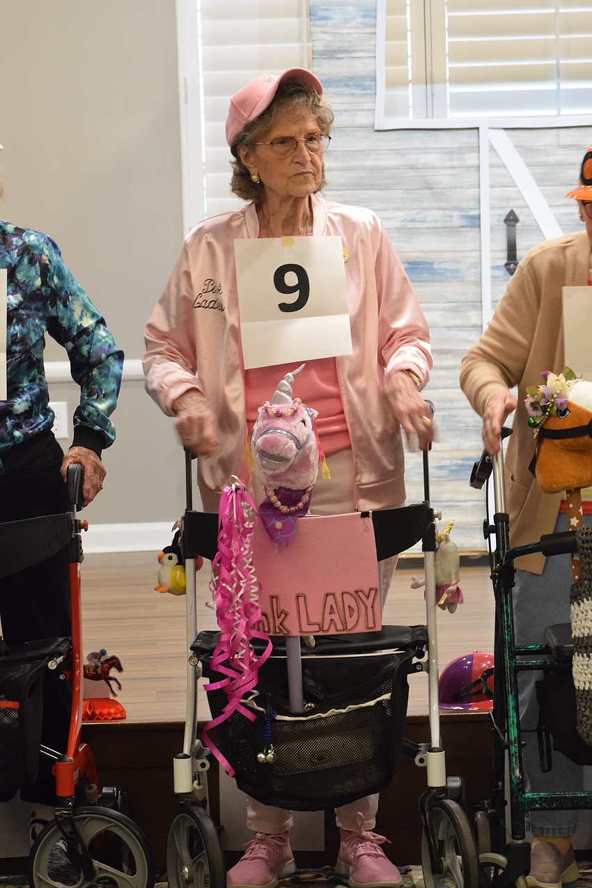 Grand Living at Lakewood Ranch's Gloria Green and her horse, Pink Lady, are decked out in pink.