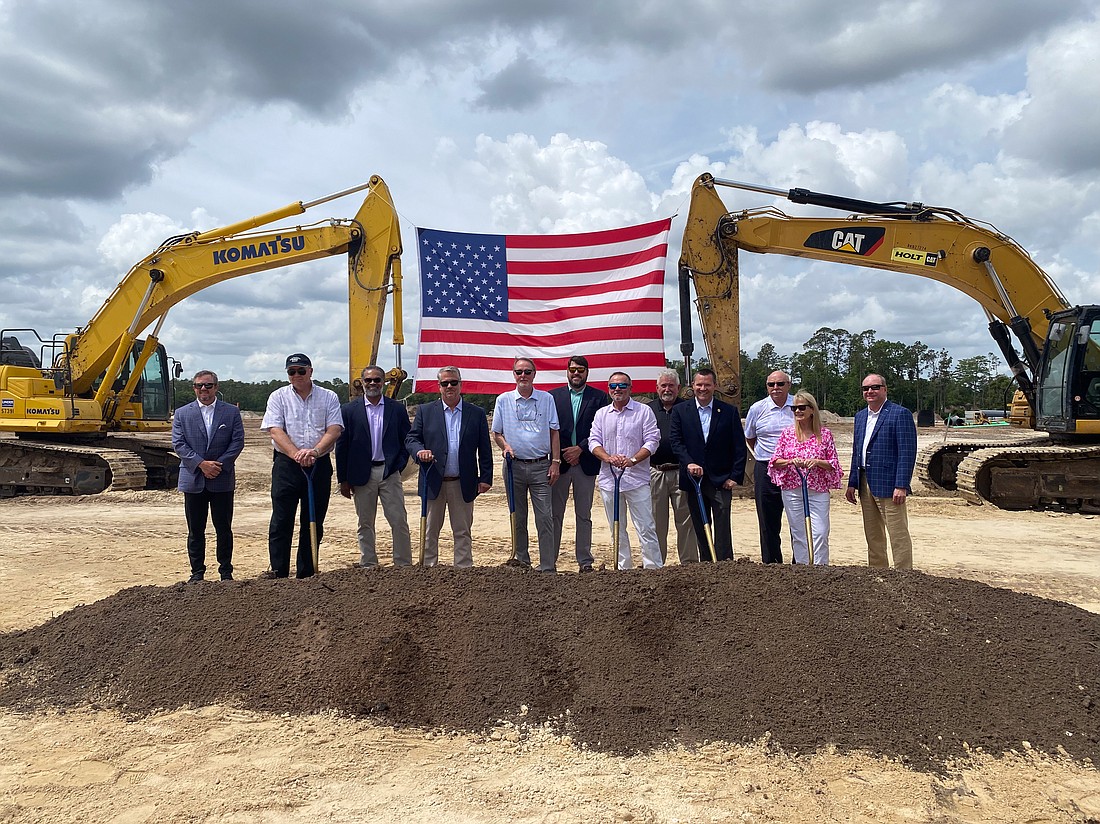 From left, Rise President Greg Blais; Southern Ventures CEO Lowell Larson; Rise COO Courtney Gordon; Rise Senior Vice President of Project Management Paul Morgan; Terry Phillips with Joyce Development; Rise CFO Greg Hunter; Randy Baugh with Development Consultants Inc.; John Joyce of Joyce Development; Jacksonville City Council member Will Lahnen; Mike Junk with Gate Petroleum Co.; Becky Hamilton with Gate Petroleum Co.; and Rise CEO Ryan Holmes.