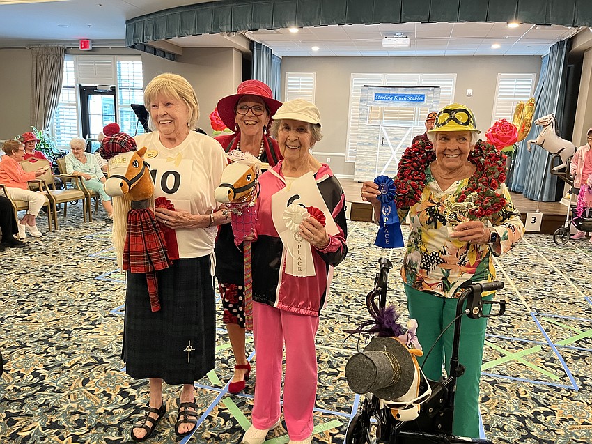 Bea Gardner celebrates her second place win with Crow Barnett, a facet assistant, Olga Bracciano, who placed third, and Carol Franklin, who placed first.
