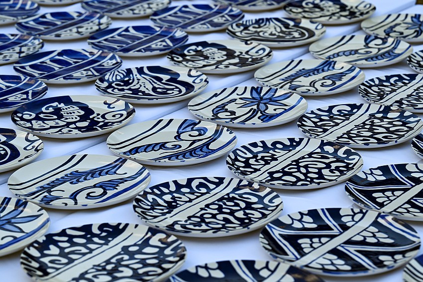 Each guest received a hand-painted plate by the event's artist, Molly Hatch.