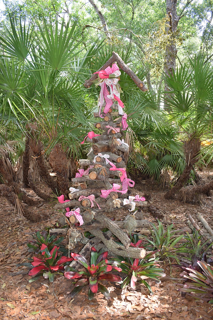 One of the first pieces of art on the Peaceful Path is a tree Jamie Reagan created. She decorates the tree to match the season.