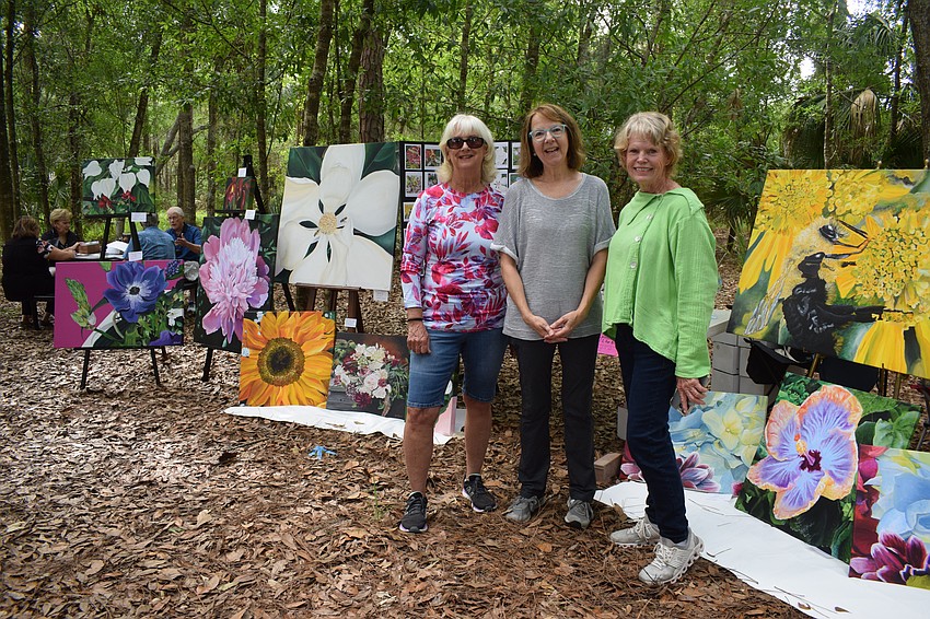 Toni Muirhead and Jamie Reagan coordinated Artists on the Path for artists like Mill Creek's Debbie Snow (center).