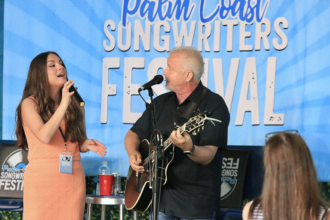 Lauren Mascitti and Frank Myers performing together at the Songwriters Festival.  Photo by Sierra Williams