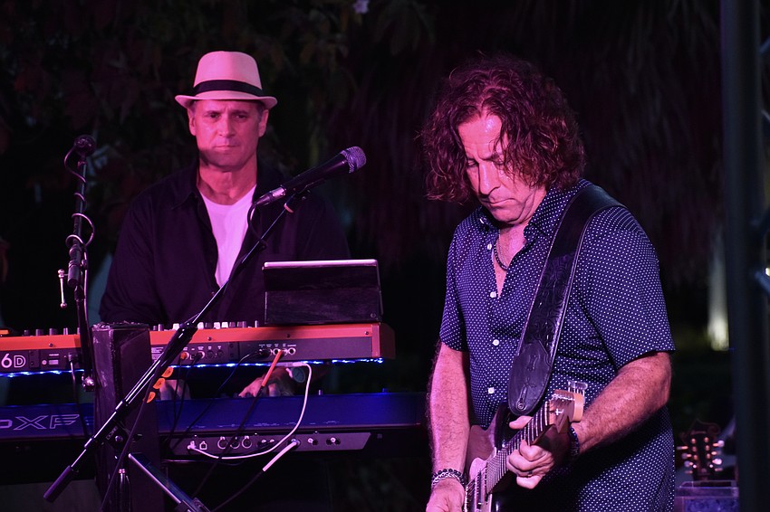 Brandon Sommers and Alan Grant of The Alan Grant Band offer a performance.