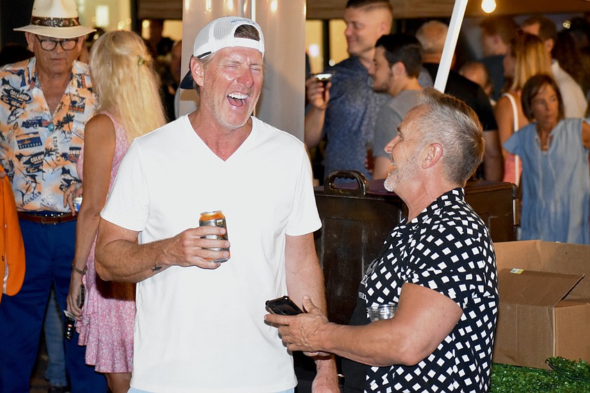 Mike Kopp and Max McCloud have a laugh together.