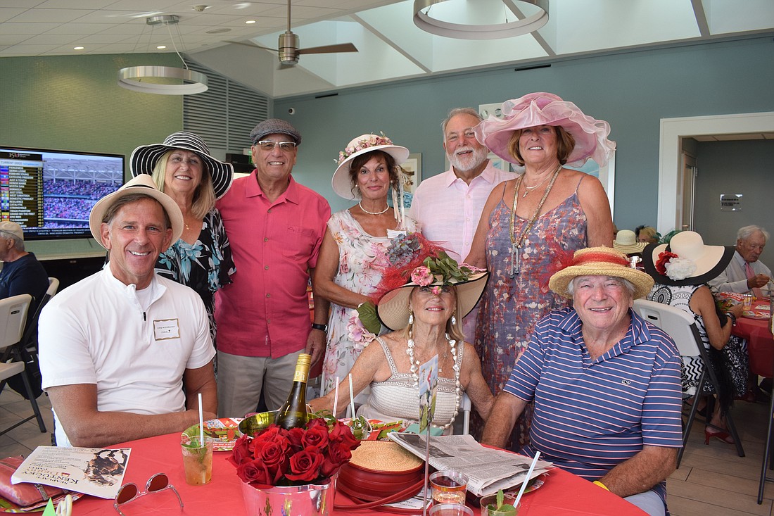 Front row: Cory Modersohn, Jan Mackell and Mauro Privilegi. Back row: Sherri Kaufman, Harold Kaufman, Alan and Robin Zuckerman at the Seaplace Kentucky Derby Party