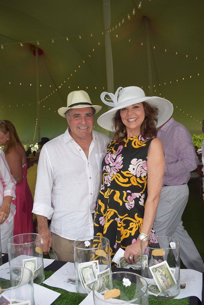Monte Di Carlo and Ronna Bridges at the Longboat Key Club Kentucky Derby party.