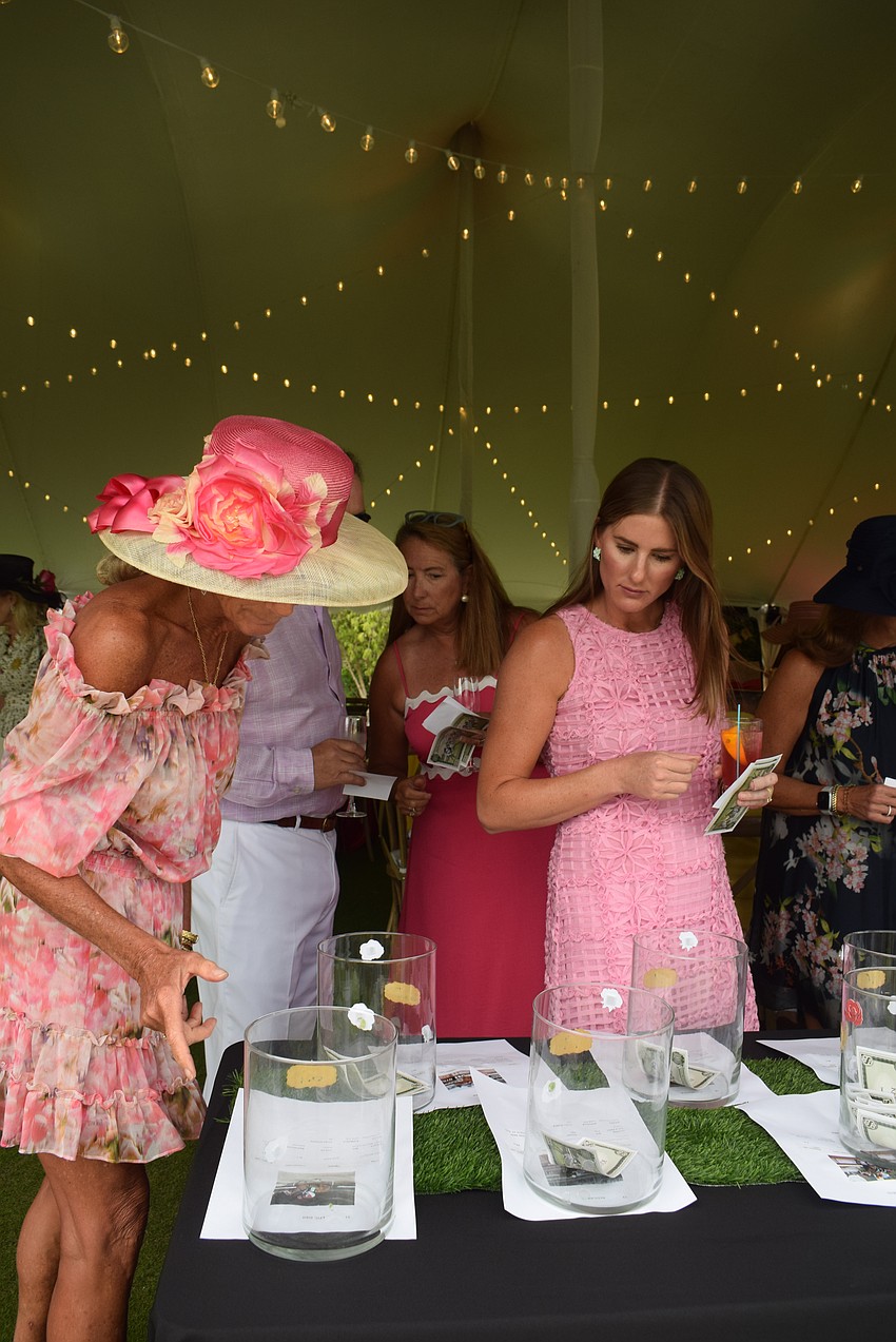 Guests placing bets at the Longboat Key Club Kentucky Derby party.