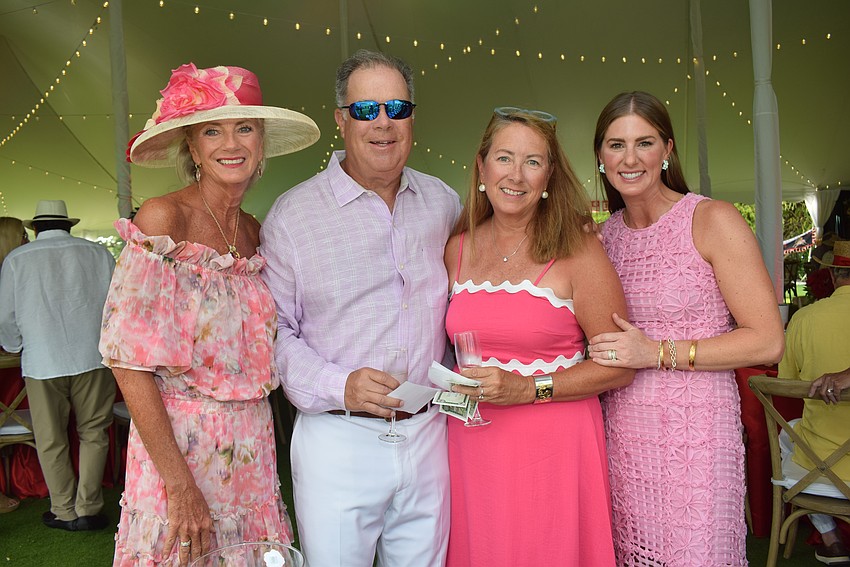 Marilyn Dollie, Chris Follie, Marnie Taylor and Becky Follie at the Longboat Key Club Kentucky Derby party.