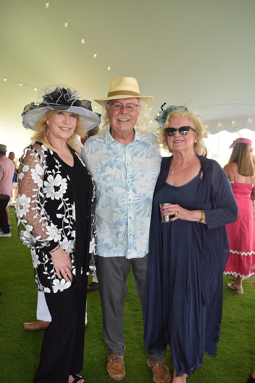 Ada-Helen Bayer, Michael Jordan and Sherri Dougherty at the Longboat Key Club Kentucky Derby party.