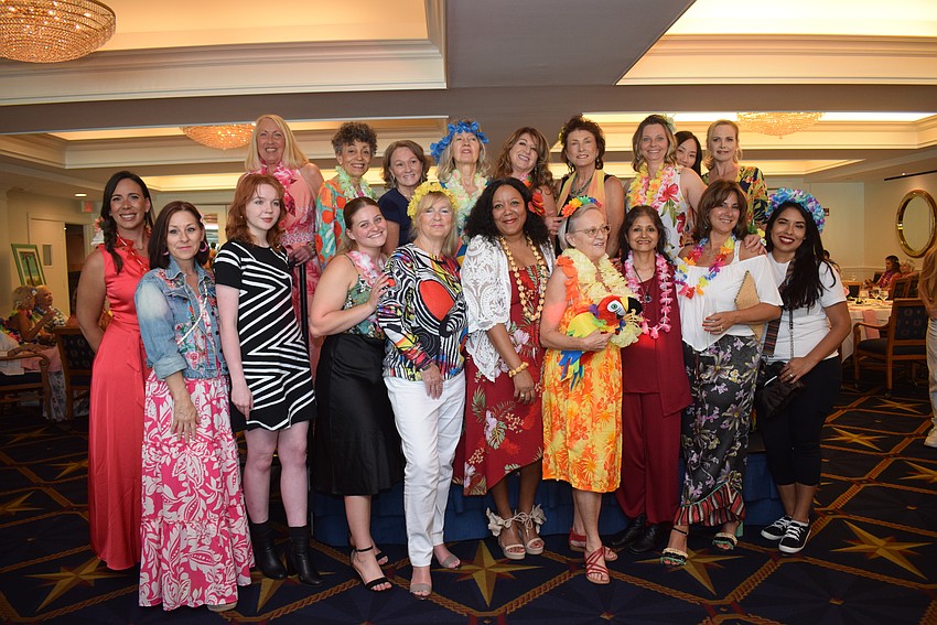Femcity of Sarasota hosts a Hawaiian-themed party for its spring fashion show on May 2.