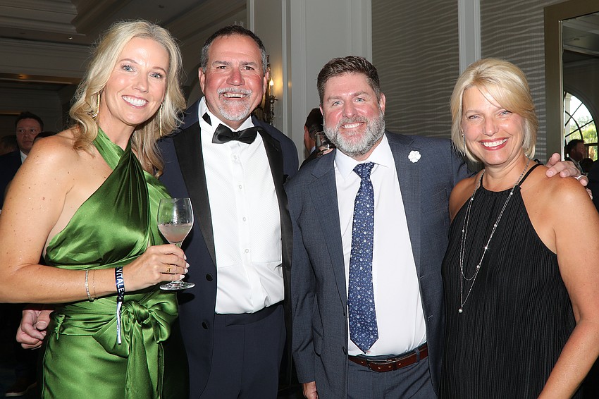 Robin and Torrin Bottrell with Mike and Terri Snider