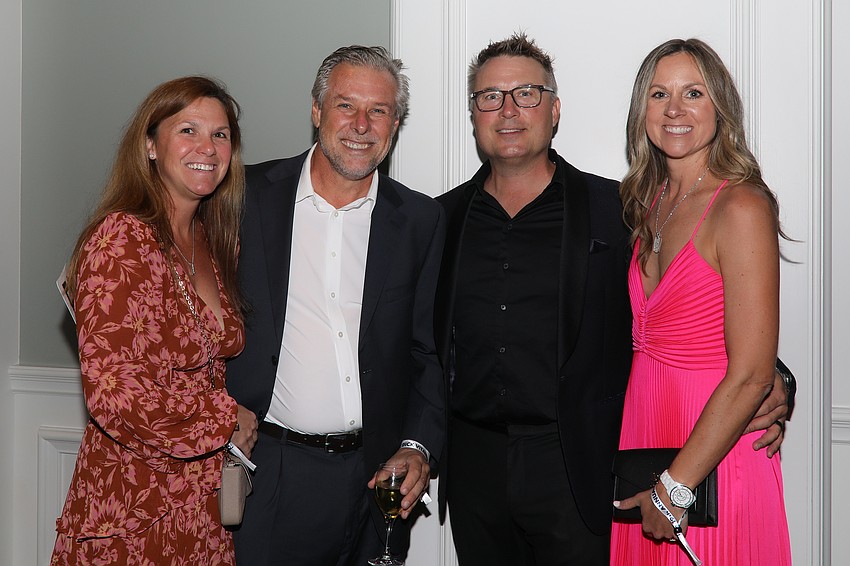 Amanda and Evan Berlin, with retired Tampa Bay Devil Rays shortstop turned attorney, Jamie Ebling, and wife, Tara