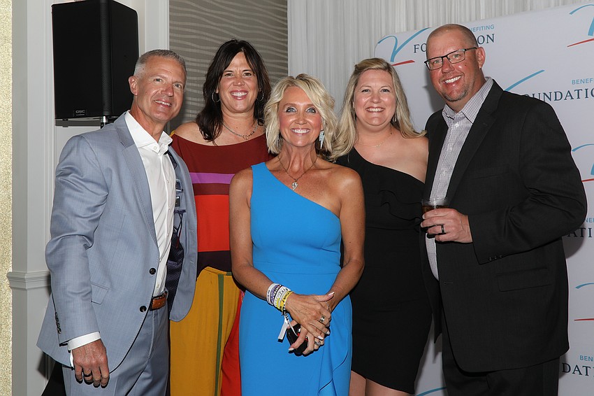 Craig Schroeder, Margaret McCaffery, and Stacy Schroeder, with Darcy and Brad Schaefer