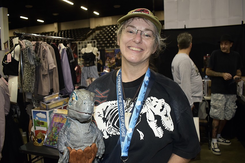 Attendee Valerie Smith gave guests an experience with one of the dinosaurs of Jurassic World.