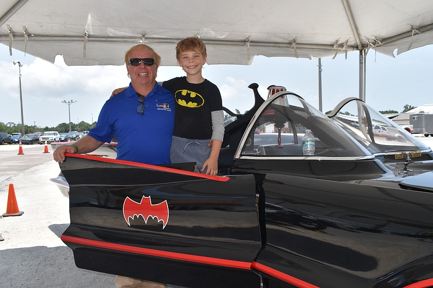 Eugene Nock and his son Easton Nock, 8, of Longboat Key, showcased Eugene Nock's prized possession: one of the Batmobiles from the original Batman TV series starring Adam West.