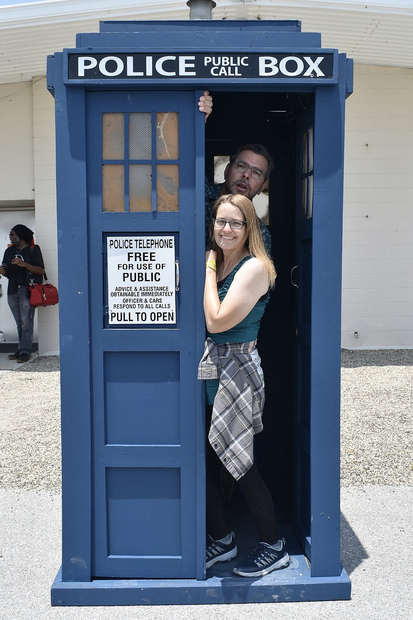 Chris and Jennifer Clemente have fun in the TARDIS.