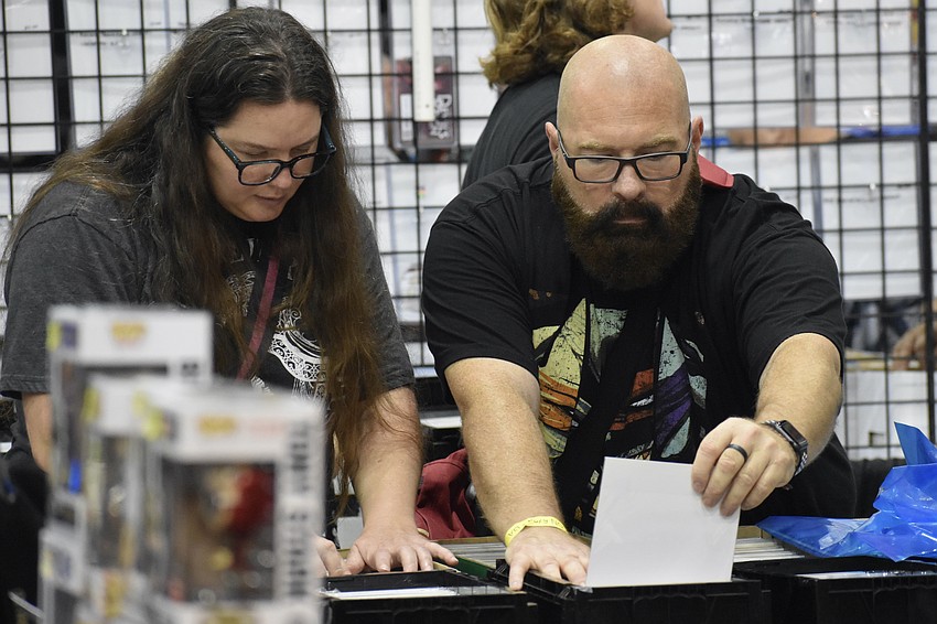Kristen Raulerson and Steve Brown browse the vintage items on offer.